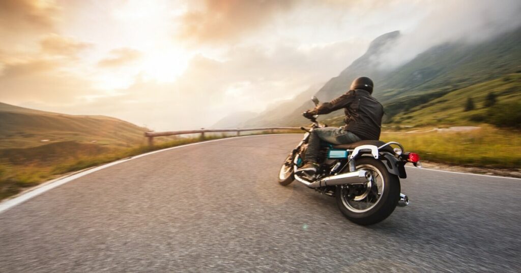 A Motorcycle Rider rider chasing down the horizon